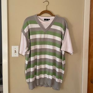 Striped vest over white tee